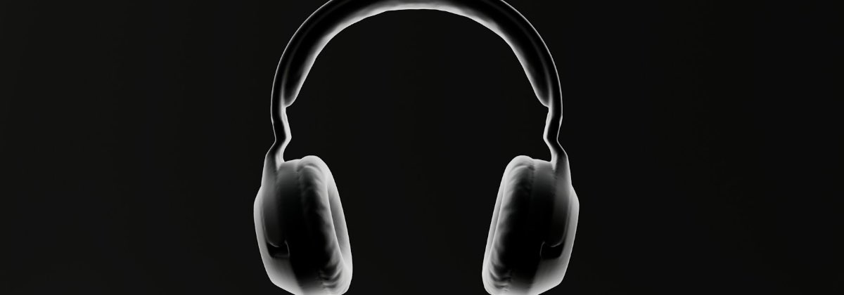 Person listening to music on headphones with eyes closed