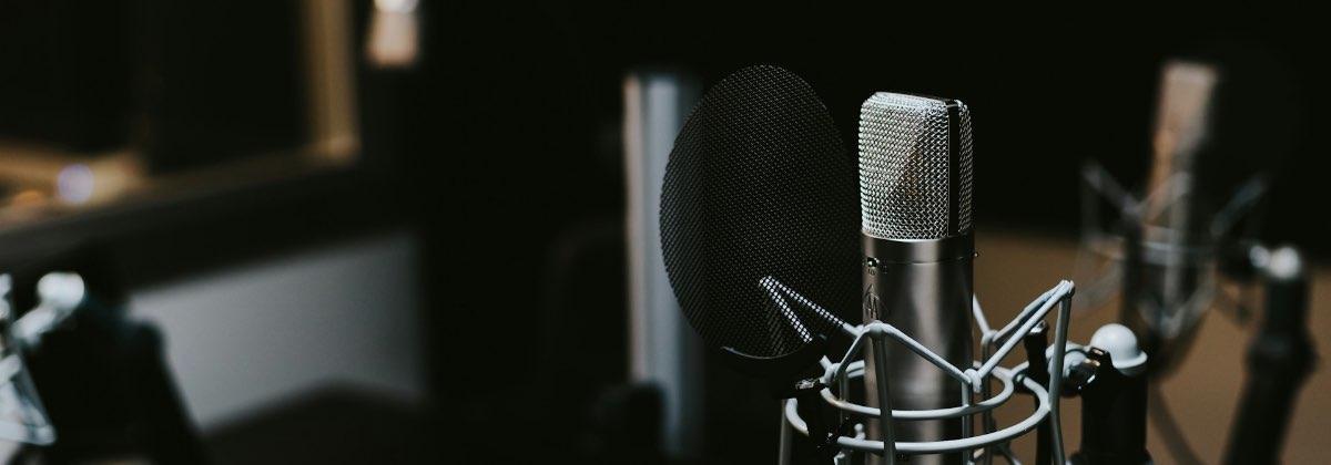 Studio condenser microphone set up to record a solo lead vocal in mono