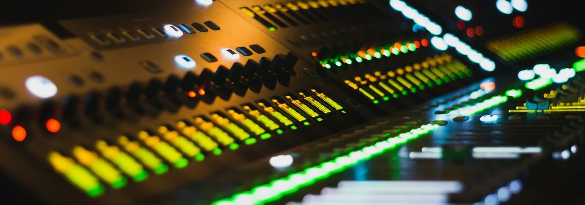Digital audio waveform on a studio monitor displaying sample rate frequencies