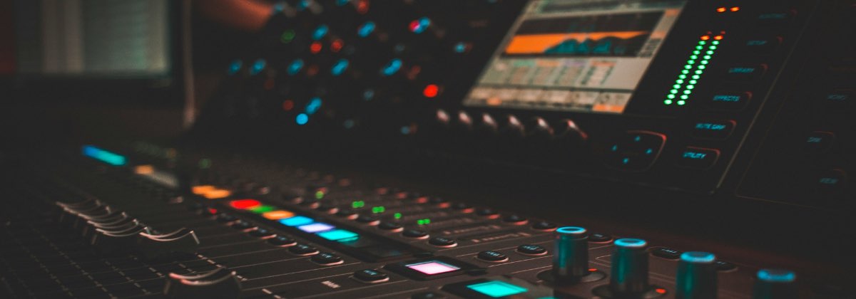 Music producer using audio editing software to change vocal tone and pitch